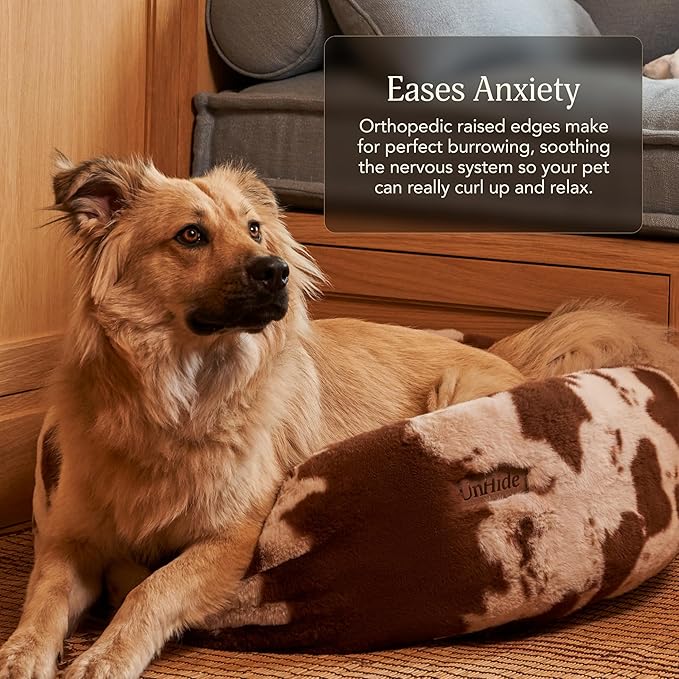 UnHide Floof Pet Bed - Small (23" x 8") - Extra Soft Dog Bed - Removable Faux Fur Cover - Machine Washable - Helps Ease Pet Anxiety & Provides The Perfect Sleep - Cowhide